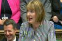 Acting Labour leader Harriet Harman said the party would not oppose the move to cut tax credits