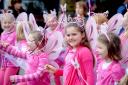 Youngsters enjoy the parade along The Grove during last year’s Ilkley Carnival
