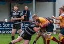 Jason Moss who played his 150th league game for Otley, making the challenge