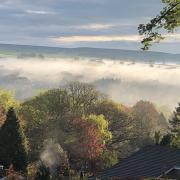 Mist over the Wharfe Valley by Mike Ridgway