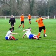 Otley (orange) faced off with Pool (white) in the cup. Pic: Nicola Driffield