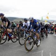 The Peloton climbs Cairn o' Mount during stage eight of the AJ Bell Tour of Britain from Stonehaven to Aberdeen in 2021 (PA)
