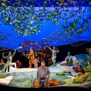 The Cunning Little Vixen at Leeds Grand. James Rutherford (front centre) as The Forester. Image credit Tristram Kenton