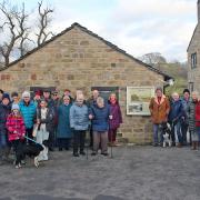 Crowds gather to witness the unveiling of the information board at High Mill, Addingham