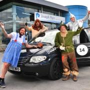 From left, a team from Joseph Parr in Wizard of Oz fancy dress, Jack Morris as Dorothy, Shaun Vause as Lion, Michael Beaumont as the Scarecrow and Shaun Green as Tin Man