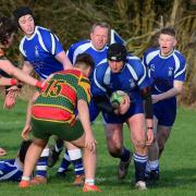 Veteran Old Otliensians player Richard Smith drives forward with the ball for the seconds at the weekend.