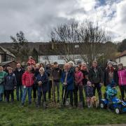Members of Wildlife Friendly Otley planting an orchard at Caxton Park/Westbourne Park