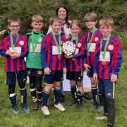 Pictured are the winning team with Assistant District Commissioner, Maz Jennings. From left to right - Peter, Ben, Sebastian, Joseph, Finnbar and Lorcan