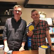 Mike Sansbury, manager of The Grove Bookshop in Ilkley is pictured (left) with author David M. Barnett