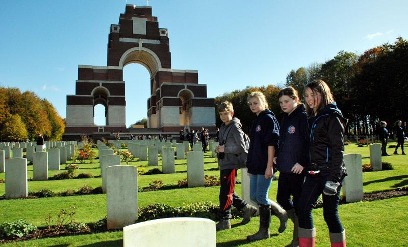 Pictured are Matthew Sykes, Helen Still, Charlotte Ross and Rebecca Nixon at the Thiepval Monument at the Somme – there are more than 72,000 names who have no grave