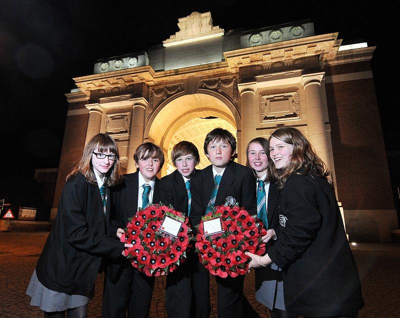 Laying wreaths at a ceremony at the main gate are, from left, Rian Scaif, Alex Johnson, Will Rowe, Nathan Spiller, Rebecca Nixon, Anna Armitage