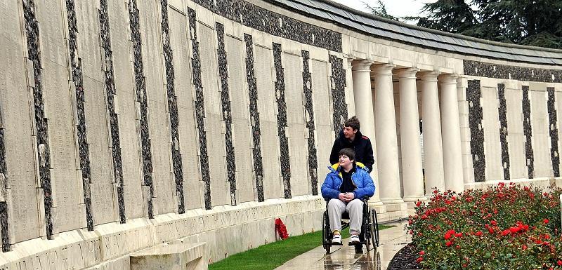 Josh Hartley, above, is shown around  Tyne Cot – the largest of all war cemeteries – by John Fletcher