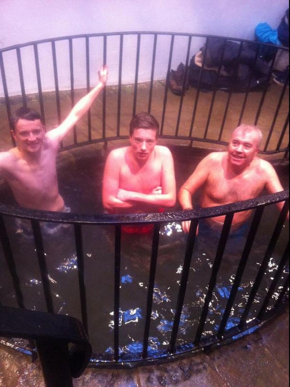 In the plunge pool are, from left, Andrew Lorimer, Ross McMillan and John Dowley