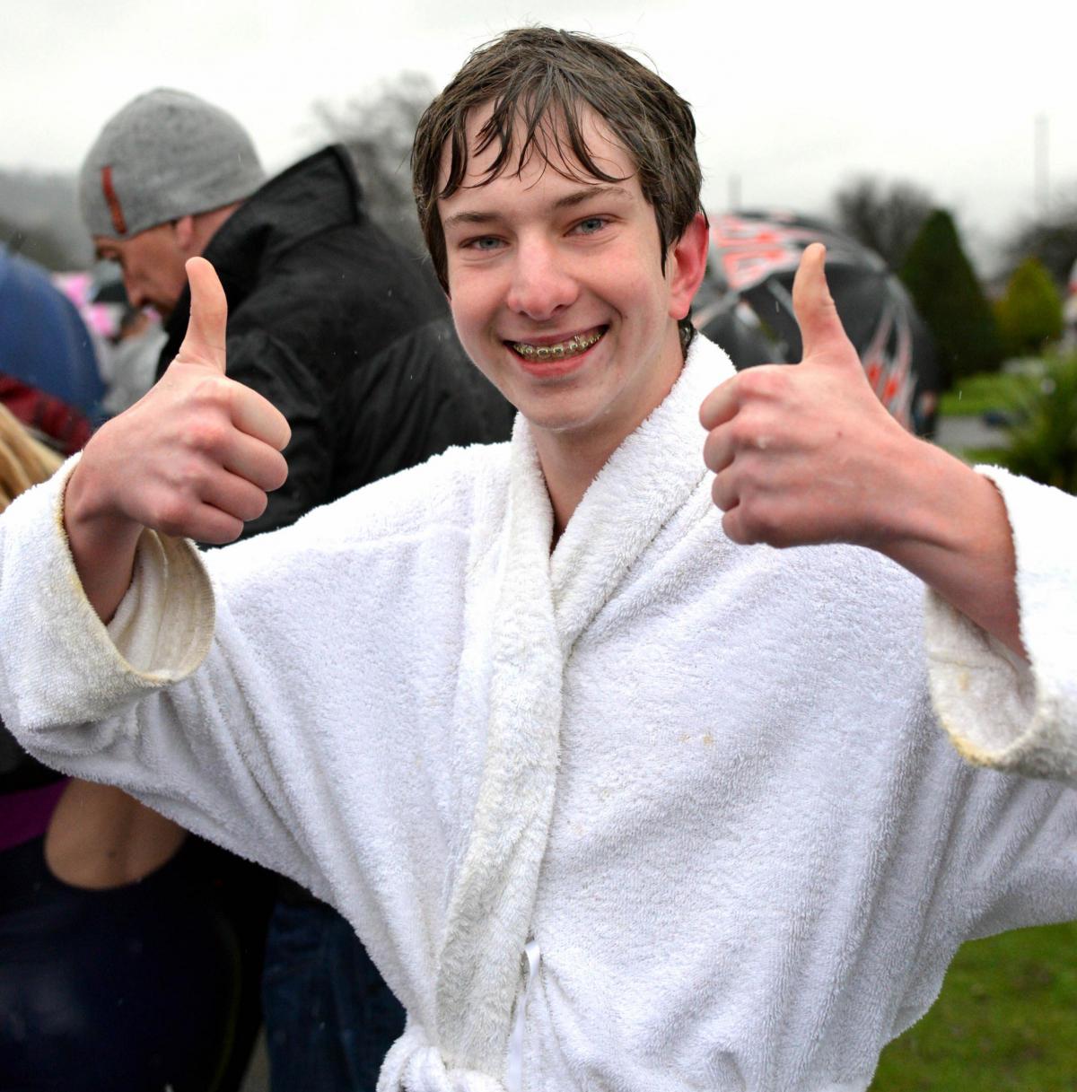 Sam Altum, from Texas, gives the thumbs-up after taking part in the ‘awesome’  Wharfe swim