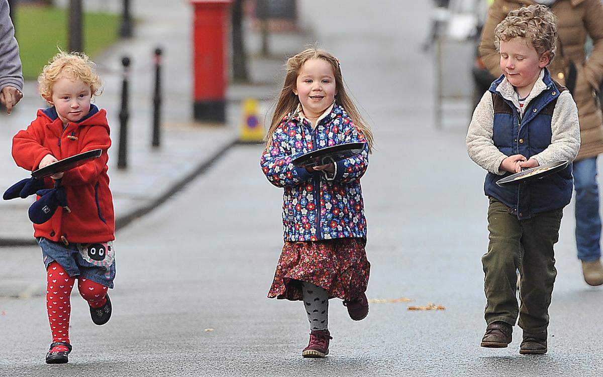 Children competing in the first toddlers’ race at the annual Ilkley Rotary Pancake Race