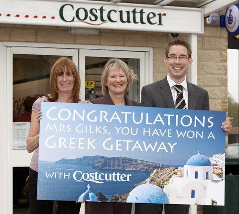 Winner Shirley Gilks, centre, with Sharron Holt, manager of the Guiseley Costcutter store, and Jonathan Hastings, Costcutter’s area manager.