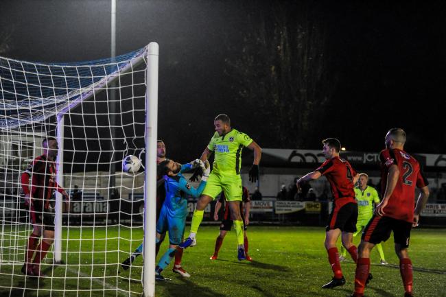 Aaron Martin, netting for Guiseley against Kettering Town in November, is about to start a two game suspension Picture: Tom Pearson