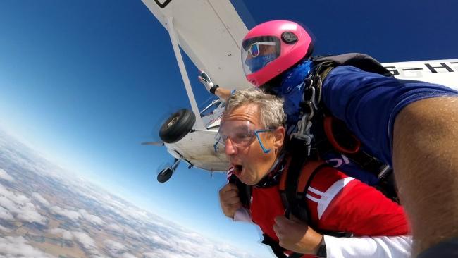 Hugh Robinson enjoying his fundraising tandem skydive.