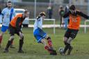 Josh Wagstaff, centre, scored a goal for Pool in the Wharfedale FA Challenge Cup