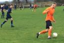 Otley (orange) drive forward in their win at Swillington. Picture: Tricia Duncan.