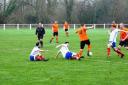 Otley (orange) faced off with Pool (white) in the cup. Pic: Nicola Driffield