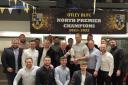 The Otley squad with their league champions trophy