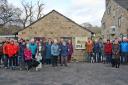 Crowds gather to witness the unveiling of the information board at High Mill, Addingham