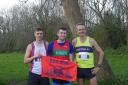 Photo credit: Gareth Bloor - Jack Cummings with the second and third placed runners after the Baildon Boundary Way