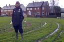 Coach Bhupendra Patel surveys the damage to Weston Lane Juniors Sports and Social Club's training ground in January.