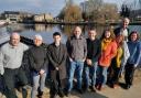 Alex Sobel at Otley Weir with local residents affected by the floods last year