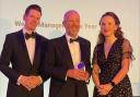 David Loudon, Joint Chief Executive of Redmayne Bentley (centre), accepting the award for Wealth Manager of the Year