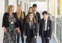 Prince Henry's Headteacher, Sally Bishop, is pictured with pupils