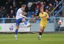 Reece Kendall (white) was a big attacking threat for Guiseley last season. Pic: Alex Daniel