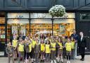 Nineteen seven-to-ten year olds from the 1st Ilkley Brownies visit Bettys in Ilkley