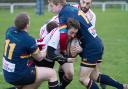 Pual Petchey is collared by two Wath defenders. Picture: ruggerpix.com