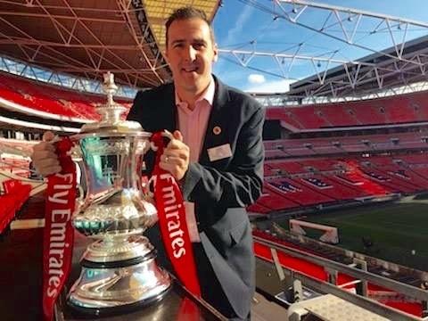 Guiseley Community Foundation Development manager Steve Taylor, pictured here with the FA Cup at the Twinning Project initiative at Wembley, needs someone to work alongside him.