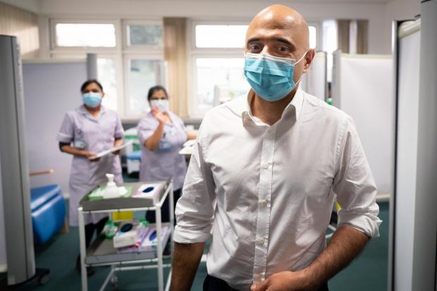 Wharfedale Observer: Health secretary, Sajid Javid visits St George's Hospital in south west London where he talked to staff and met Covid 19 patients who are being treated with a new anti-viral drug. Photo via PA.