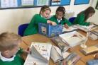 Horsforth Featherbank pupils with their new dictionaries