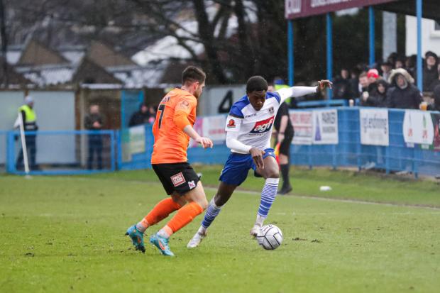 Thierry Latty-Fairweather (white) made 21 appearances for Guiseley during his loan spell. Pic: Alex Daniel