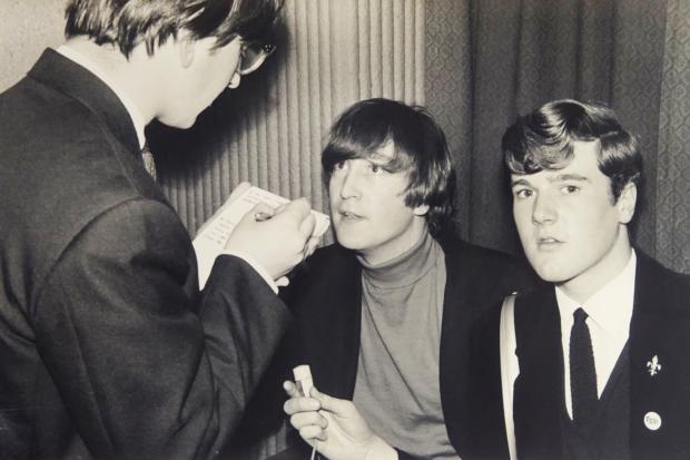 John Hill, right, with John Lennon and an unknown newspaper reporter
