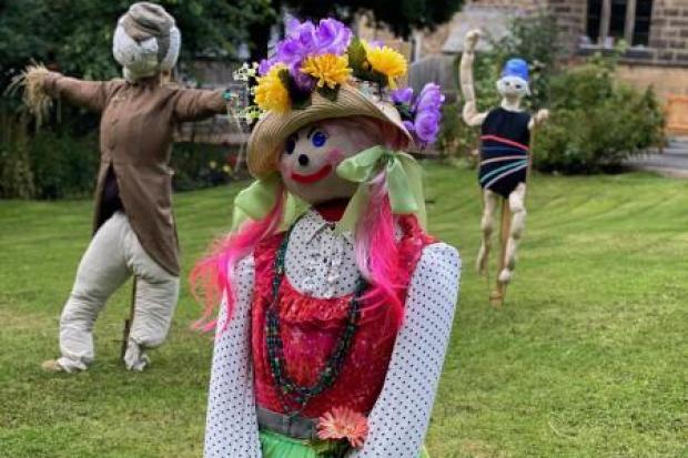A few of the many scarecrows on show on the church lawn