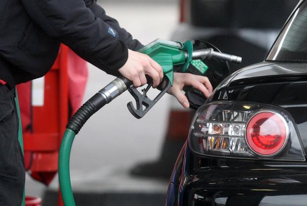Wharfedale Observer: Someone using a fuel pump at a petrol station (PA)