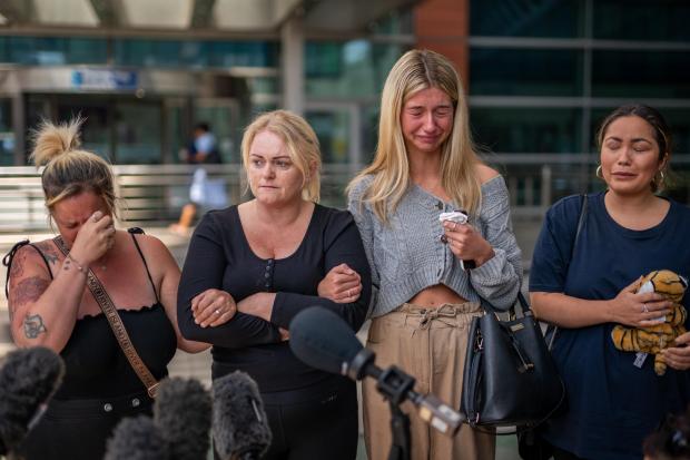 Wharfedale Observer: Hollie Dance (second left) surrounded by family and friends, outside the Royal London hospital in Whitechapel, east London