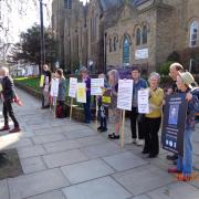 Amnesty members in vigil on The Grove, Saturday 26th March 2022