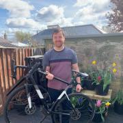 Ilkley Grammar School biology teacher Ryan Scott with his bike