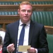 MP Robbie Moore speaking in Parliament