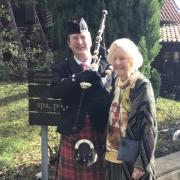 Mary Greaves celebrates her 101st birthday, pictured with piper Malcolm Smith