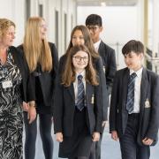 Prince Henry's Headteacher, Sally Bishop, is pictured with pupils