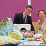 Christopher Lillington with Sewing for Fun tutor Emma Garry