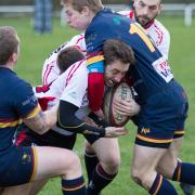 Pual Petchey is collared by two Wath defenders. Picture: ruggerpix.com